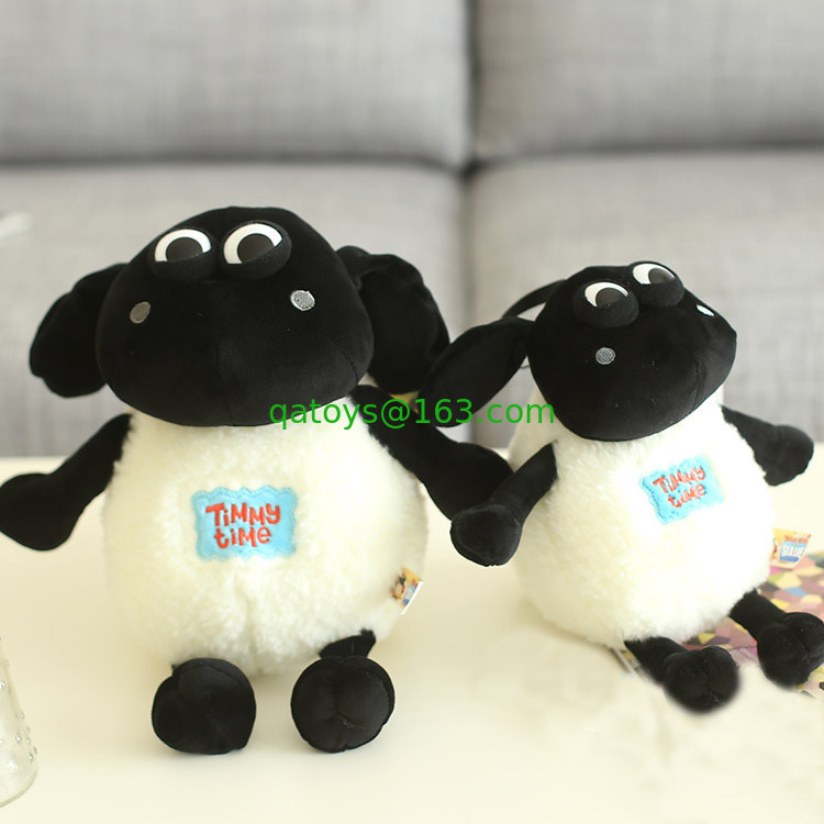 漫画の Shaun のヒツジの動物の柔らかいプラシ天は熱い詰められた黒い白をもてあそびます